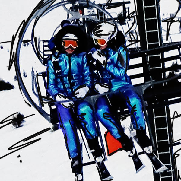two skiers on a lift